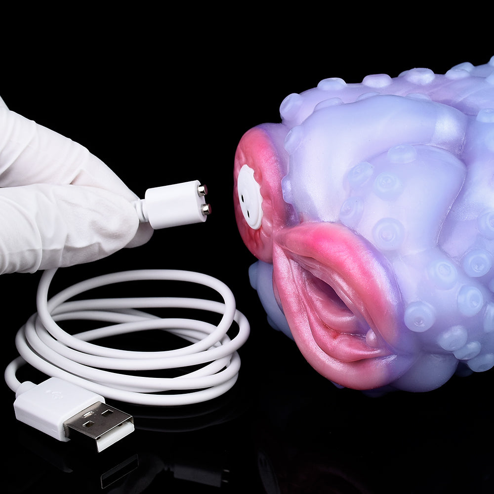 Orana Fantasy dual-hole octopus masturbator with USB cable, purple and pink.