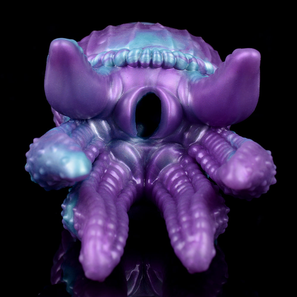 Octopus Qhela back view with central opening and thick tentacles, purple/teal