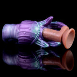 Octopus Qhela masturbator with round base ends and tentacles in purple/teal