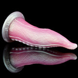 Side view of pink translucent tentacle dildo with suction-cup bumps and ribbed surface