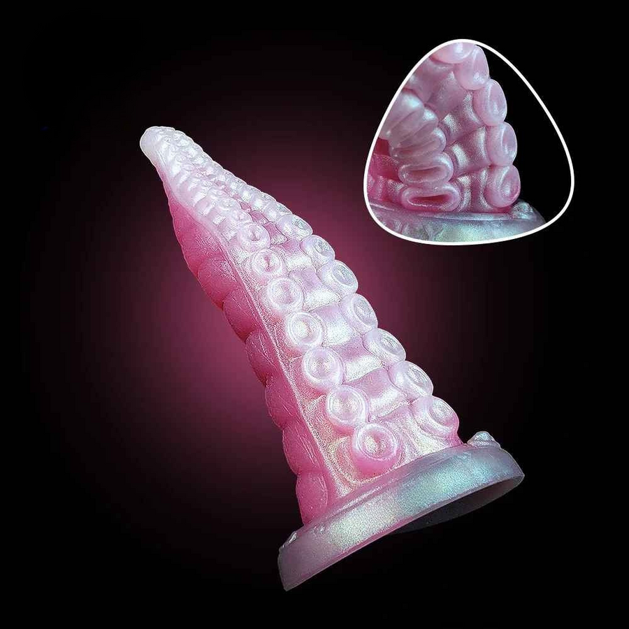 Pink dildo with detailed suction-bump texture; inset highlights raised bump rows.