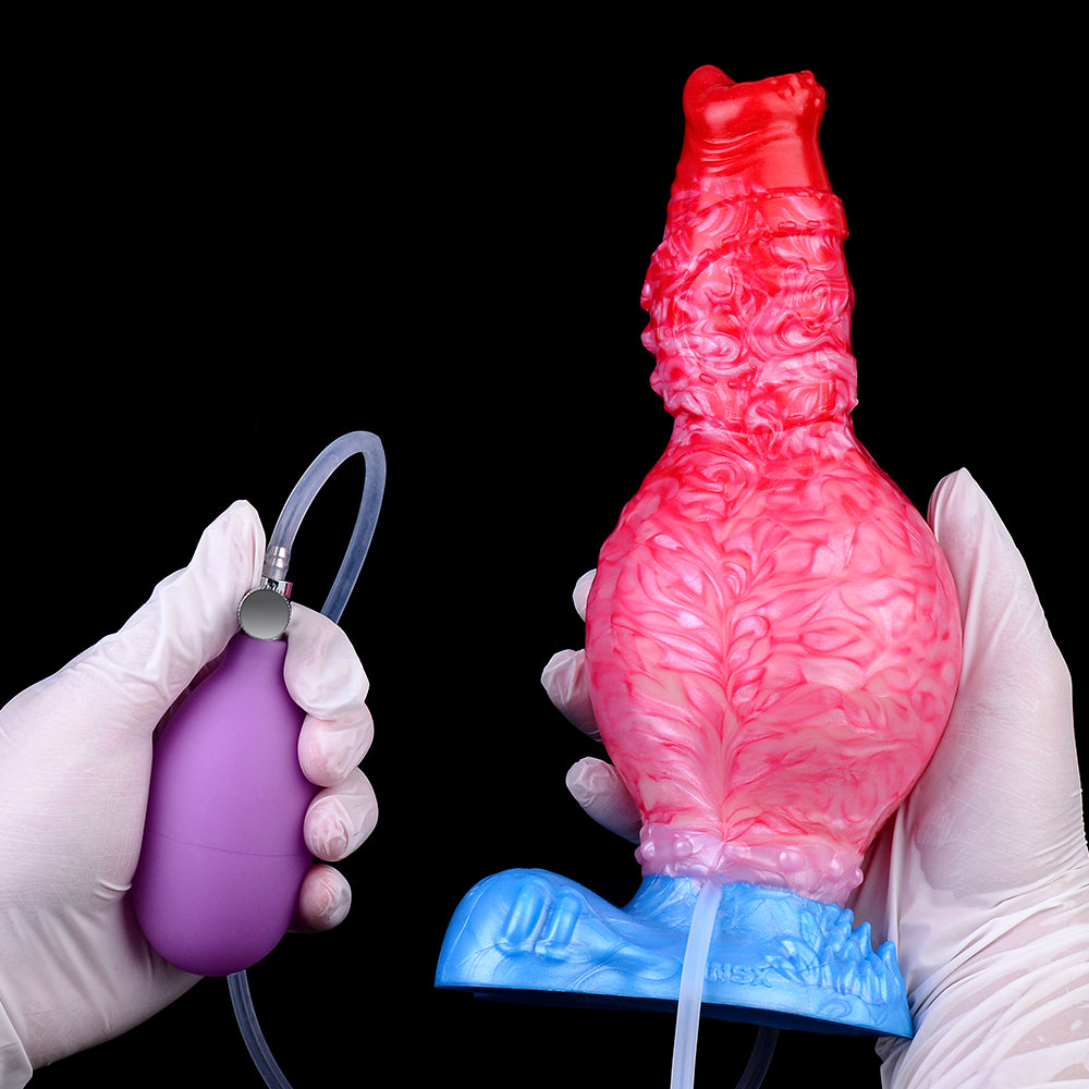 Fantasy Beast Pump-Up Dog Dildo, Hände im Handschuhen, pinkes Muster auf blauer Basis