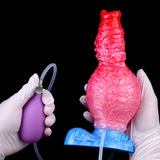 Fantasy Beast Pump-Up Dog Dildo, Hände im Handschuhen, pinkes Muster auf blauer Basis