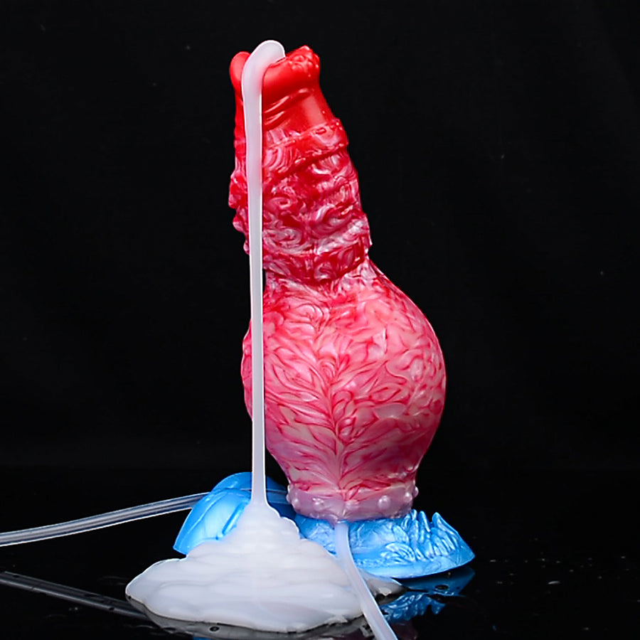 Red inflatable fantasy dog toy standing with white pump tube connected to blue base