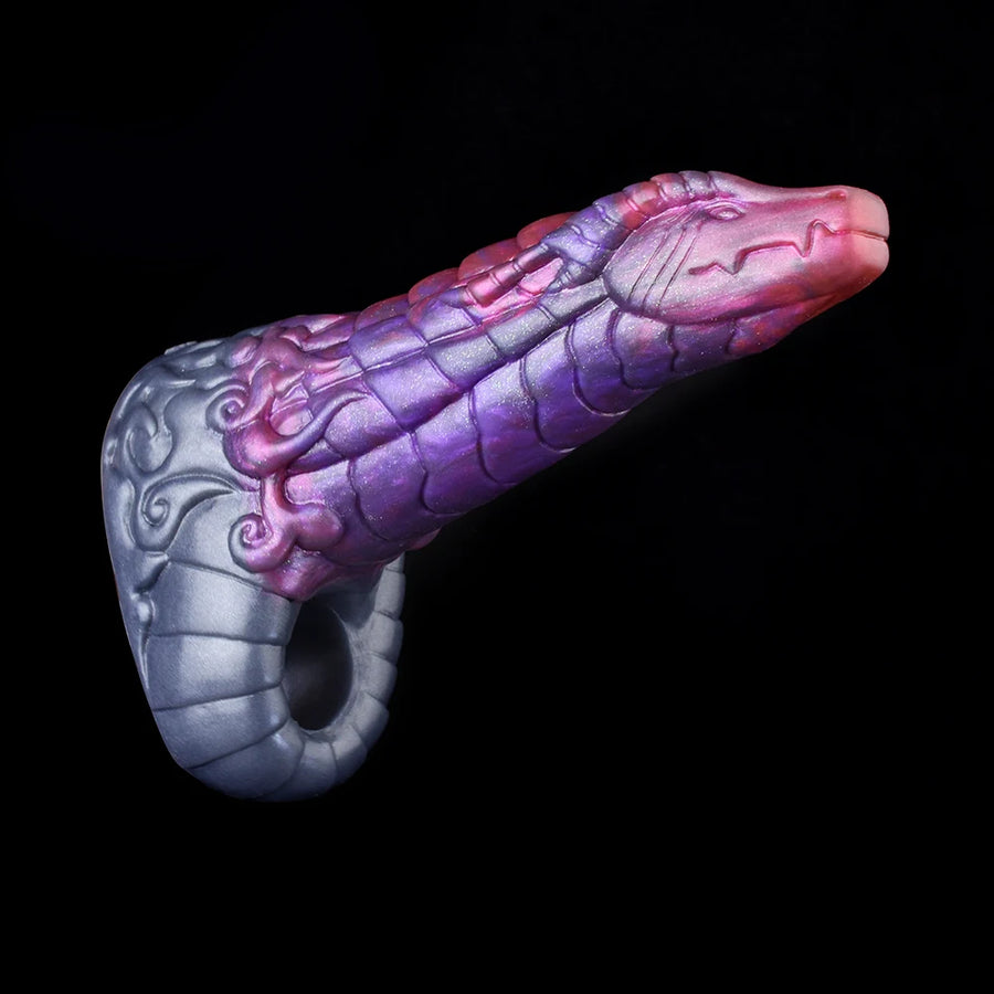 Dragon fantasy penis extender sleeve angled view, purple-pink scales with gray open end