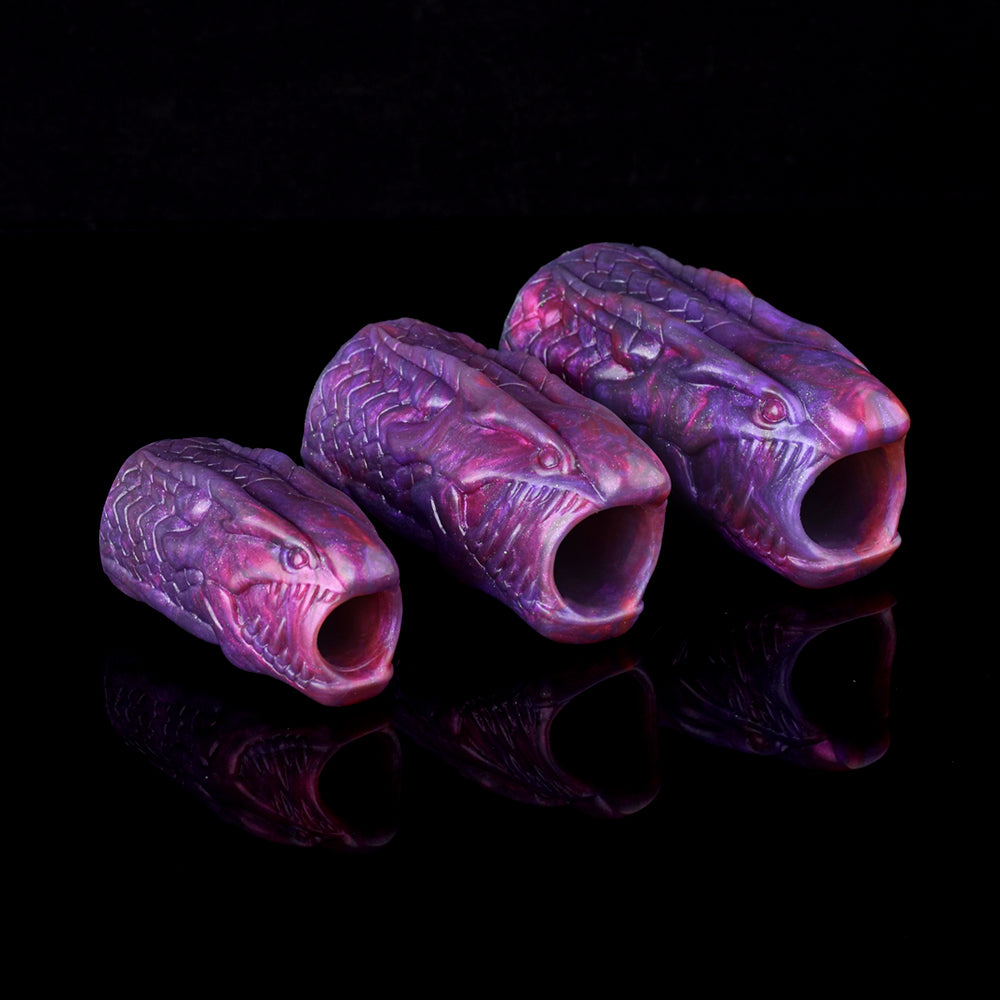 Three purple dragon penis sleeves shown from side, hollow open ends visible