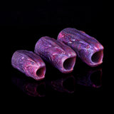 Three purple dragon penis sleeves shown from side, hollow open ends visible