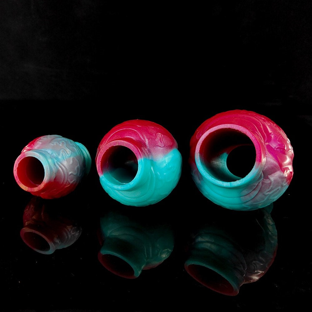 Dog knot cock ring openings, pink-and-teal gradient with textured sculpted pattern