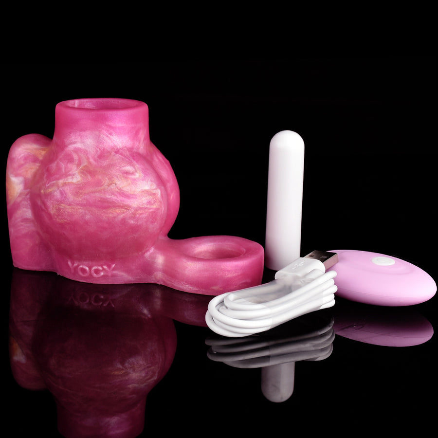 Vibrating knot cock ring with pink sleeve and ring base, glossy marbled texture