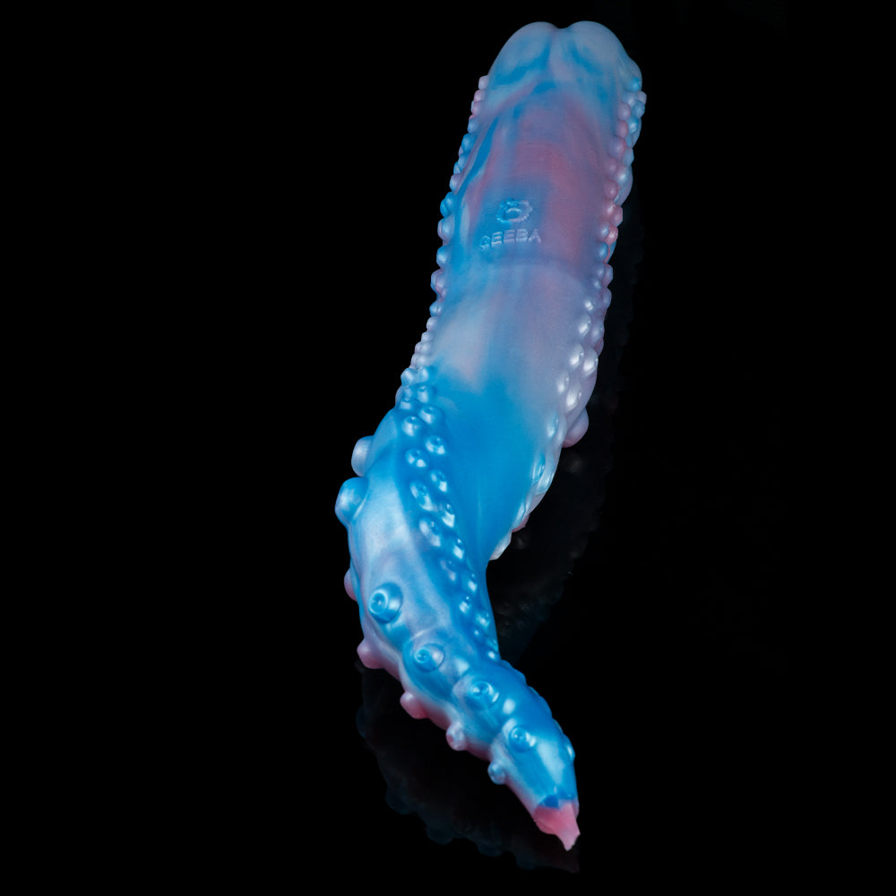 Blue-and-pink curved pleasure device shown from side with textured bumps