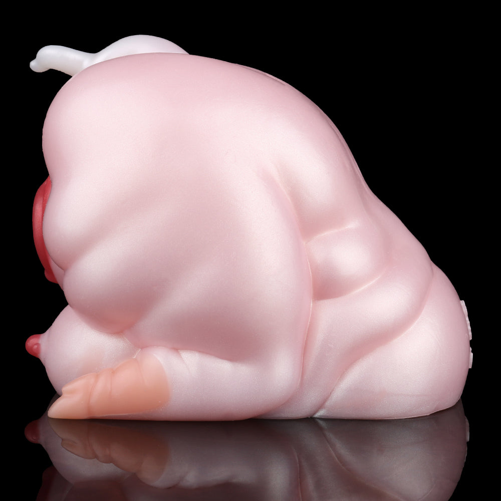 Pink pig-shaped fleshlight with pink body and small tail, close-up angle