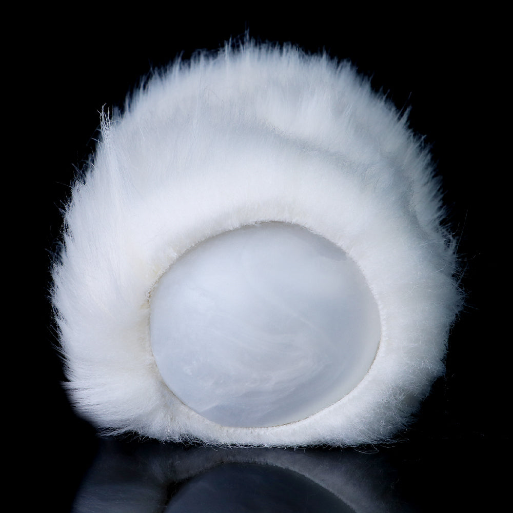 White plush polar bear sleeve with circular inner opening, end view