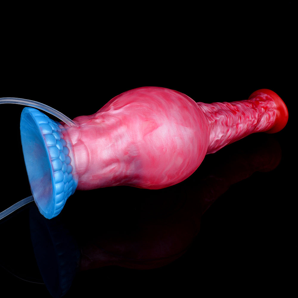 Red/pink dildo with flared blue suction-style base, clear tube attached