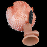 Pink pufferfish sex toy with textured spikes and open mouth