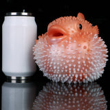 Pink pufferfish stroker with spiky nodules and open mouth