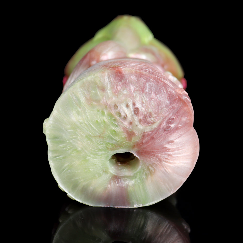 Unicorn-themed fleshlight end view: circular opening in iridescent pink and lime
