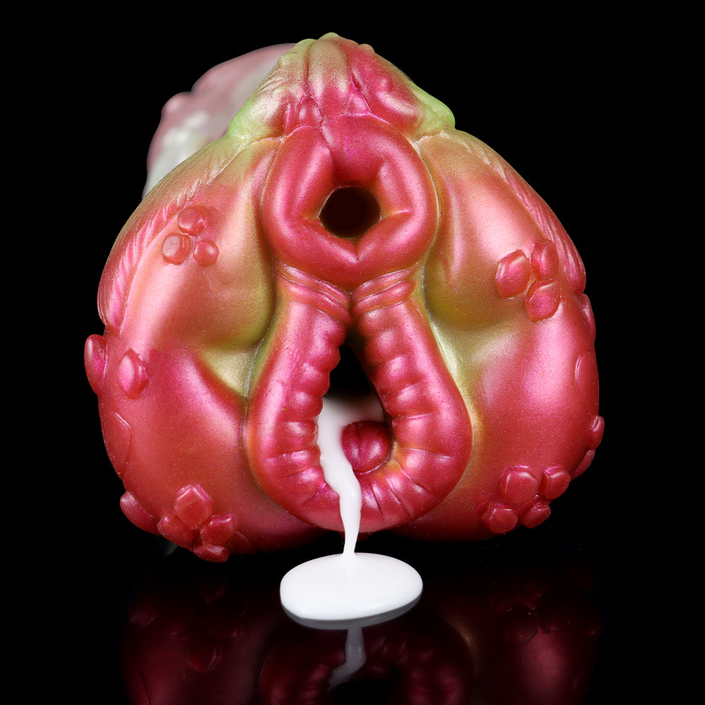 Unicorn-themed masturbator with open mouth-like opening, pink and lime finish