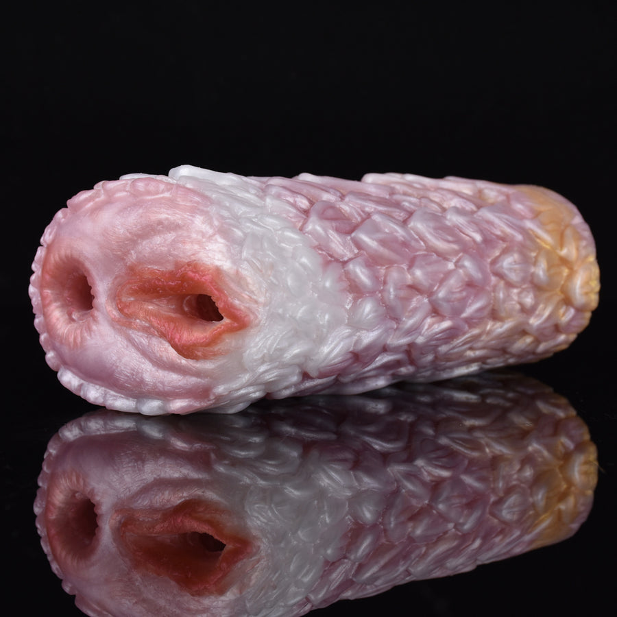 Pink and white canine-shaped Fleshlight-style animal stroker toy with textured surface
