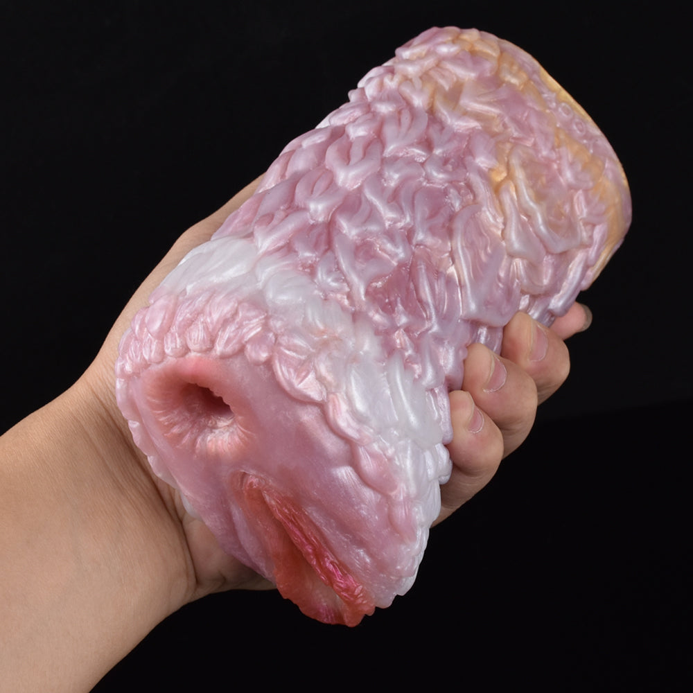 Hand holding pink canine fleshlight stroker, textured sleeve with open end.