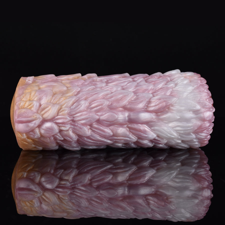 Canine fleshlight-style stroker toy shown from side, pink and white textured exterior