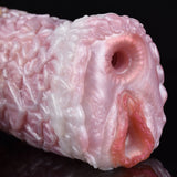 Close-up of pink canine fleshlight end opening with inner ridged channel.