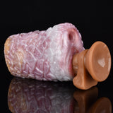 Quixis the Mad Dog stroker: pink textured canine sleeve with orange base