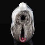 Front view of cow-shaped furry masturbator, showing dark faux fur rim and central hole