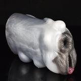 Cow-shaped furry masturbator, close side view with dark fur muzzle and pink tip