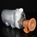 Cow-shaped furry masturbator with orange insert accessory beside the front opening