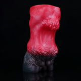 Red and black textured pleasure toy with flared, rounded end and ribbed base.