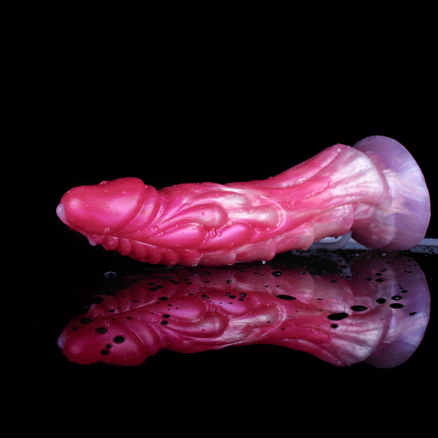 Adult novelty dildo with pink and purple swirled translucent finish, side view.