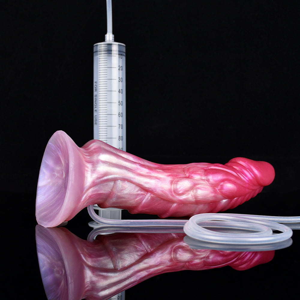 Pink realistic fantasy ejaculating dildo, suction base, connected syringe and tubing