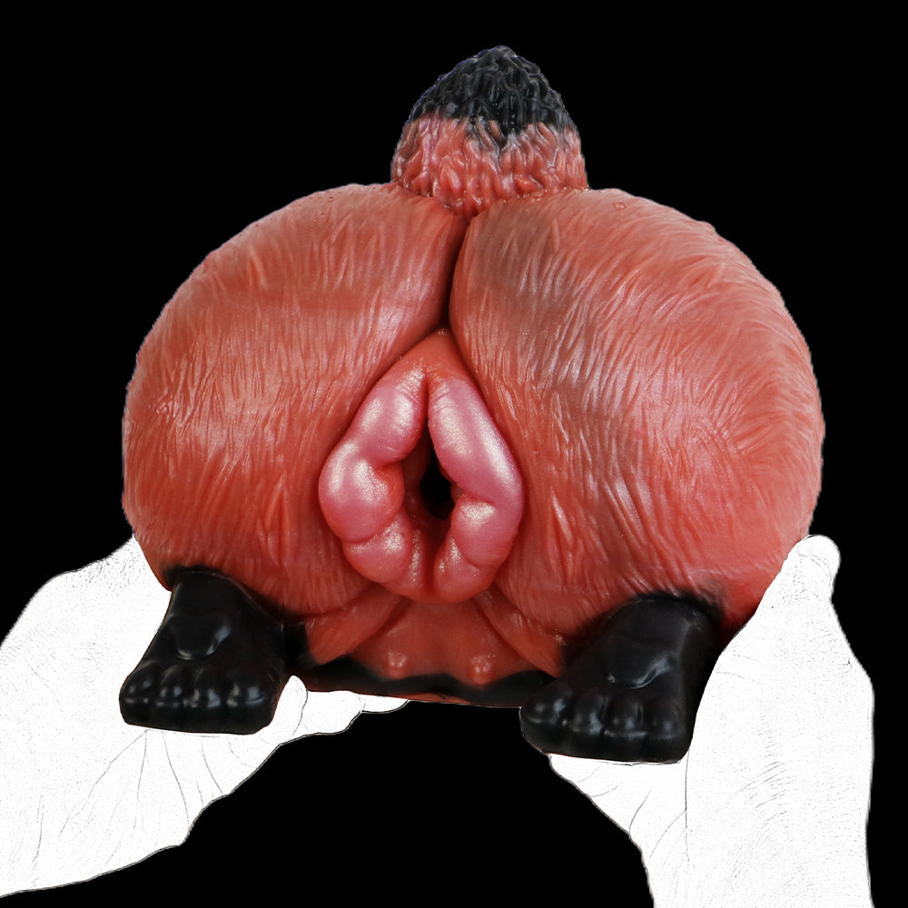 Red animal-themed sex toy insert centered opening, black base feet, front close-up