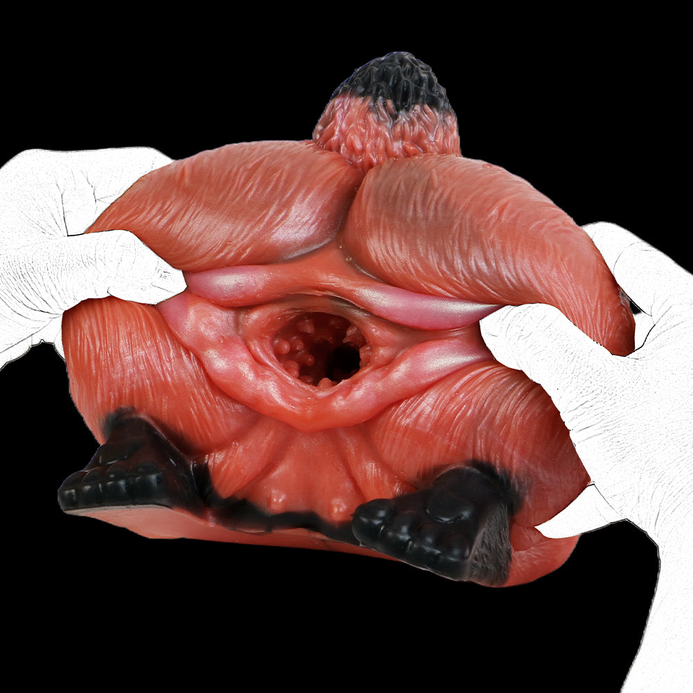 Red animal-themed insert with visible inner hole, latex gloves, black base feet