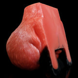 Red animal-themed insert showing side opening, smooth hollow, black accessory tip