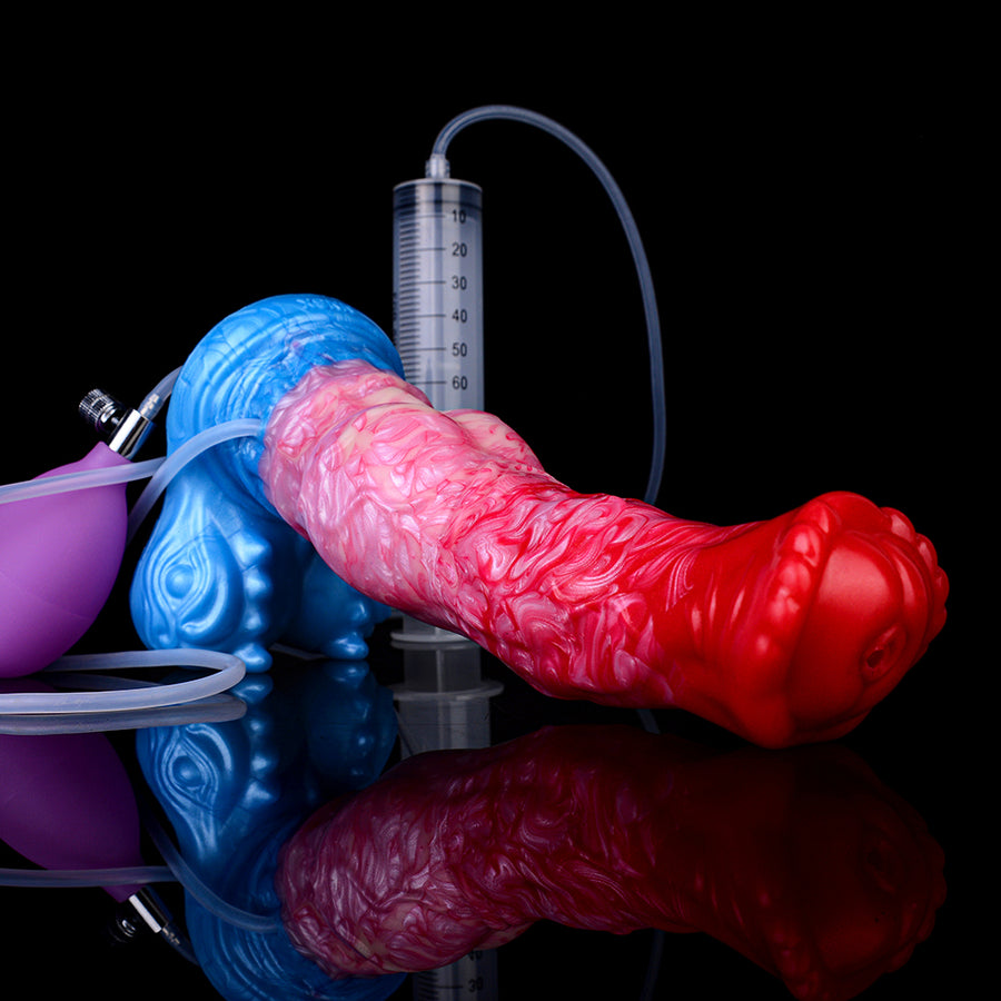Inflatable dildo lying down with red tip, pink shaft, blue base; clear tube and purple bulb