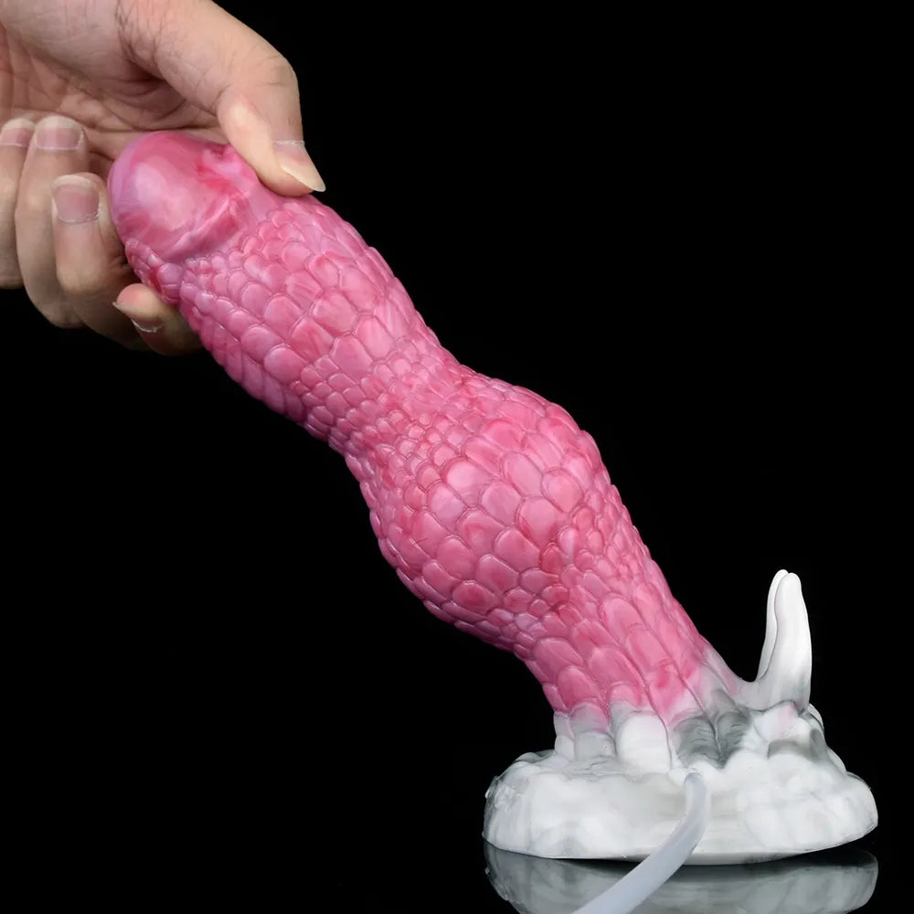 Dildo dragón rosa con escamas, soporte con succión blanco