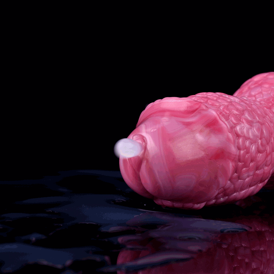 Pink textured silicone dildo with bulbous tip and white base, side view
