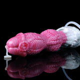 Dildo dragón rosa con textura de escamas y eyección blanca