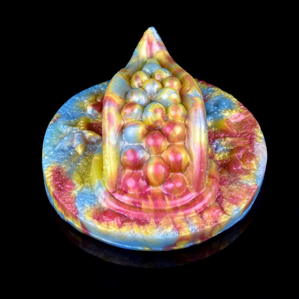 Rhea Fantasy Grinder—front view of octopus-shaped centerpiece on round base