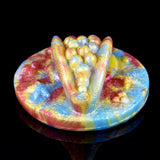 Rhea Fantasy Grinder—top view of octopus-shaped head on round grinder base