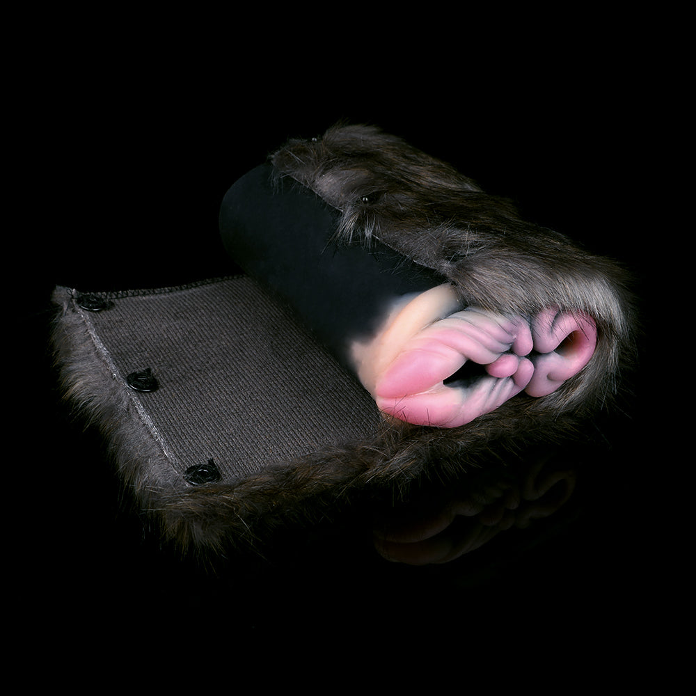 Furry rhinoceros plush sleeve with ribbed fabric pad and pink opening