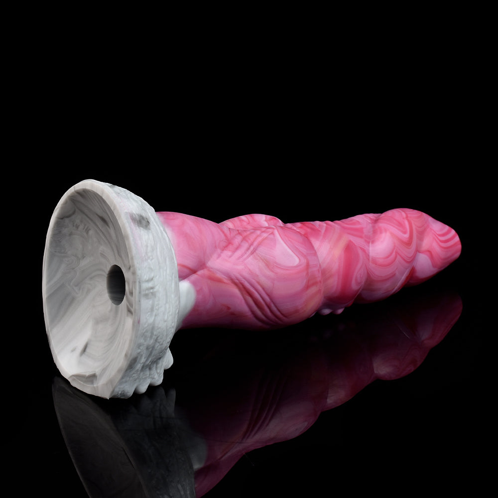 Alien-Vibrator pink marmoriert mit Saug-/Ladekopf am Sockel, gerippter Körper