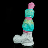 Layered view of dragon-knot penis sheath extender: pink tip, teal sleeve, white base