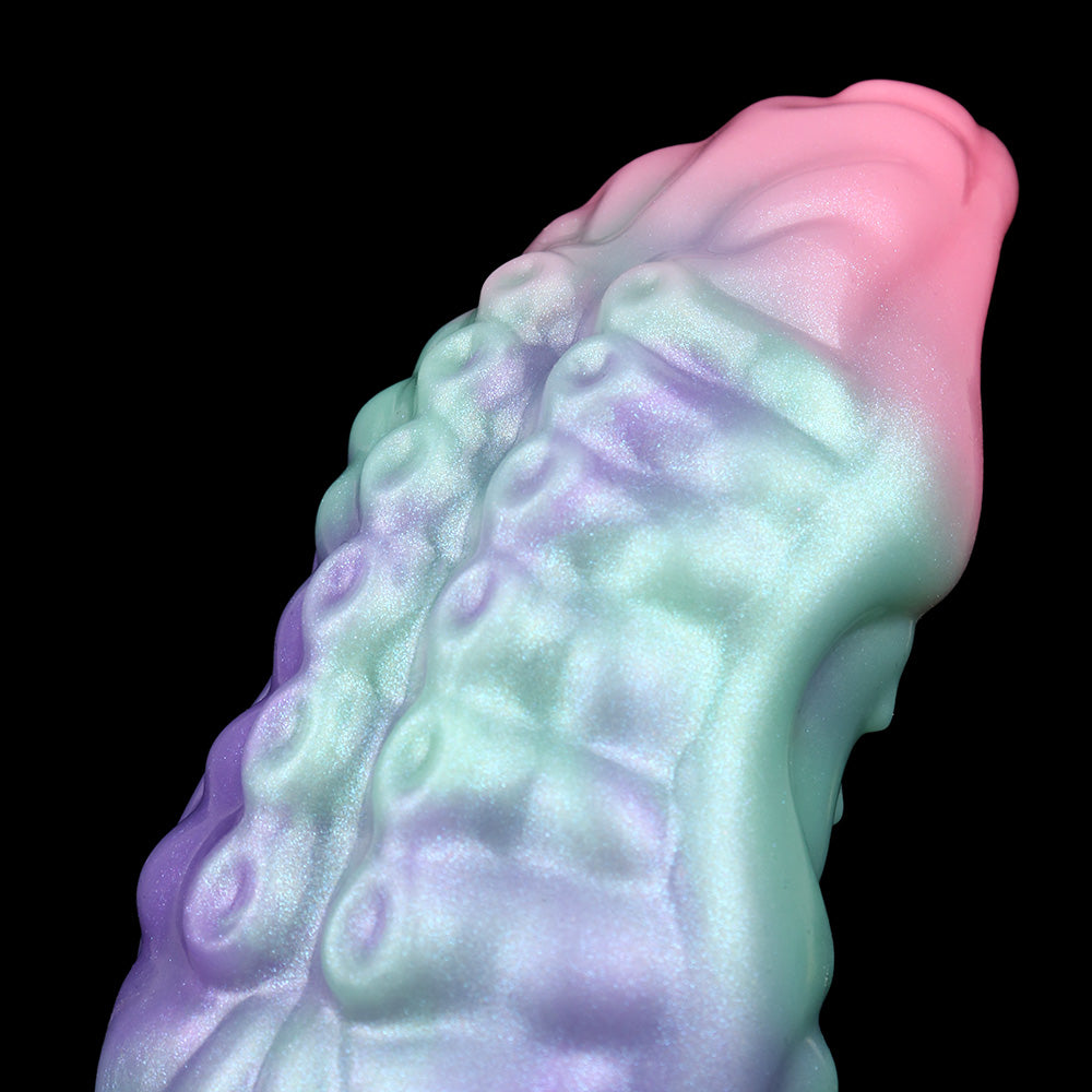 Octopus cock sheath, top close-up, glossy iridescent pastel teal and pink with bumps
