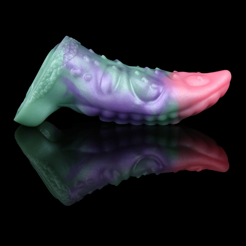 Men’s octopus cock sheath, side view with iridescent purple-green-pink finish