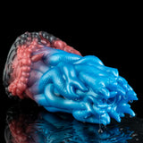 Side view of two-tone textured silicone toy, blue ridged front and maroon ribbed back