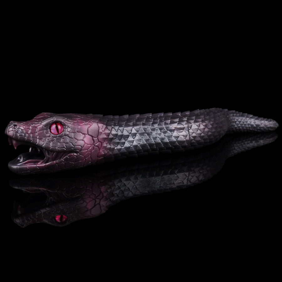 Serpentress Fleshlight creature masturbator side view with long dark purple body and open mouth