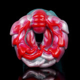 Red dragon fantasy masturbator head with eye-like opening and clawed mouth