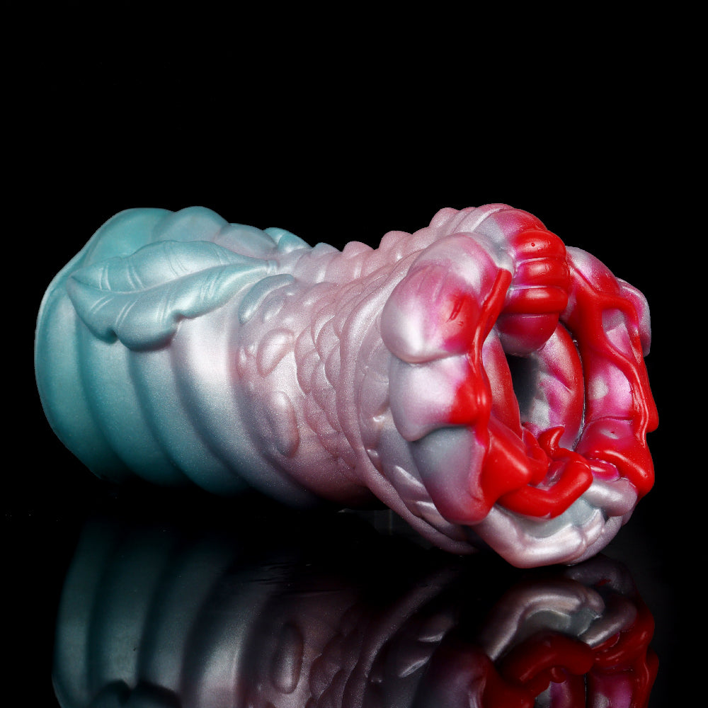 Serpentrix dragon fantasy masturbator in teal and pink with red claw-like head